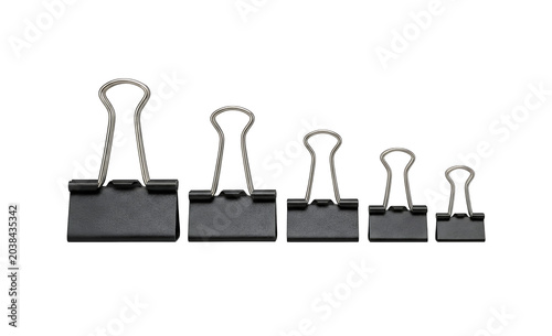 Essential office binder clips, a set of five black metal paper fasteners, various sizes for document organization, professional stationery supplies isolated on Transparent Background