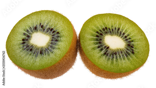 Fotografi Two kiwi fruit halves showing green flesh and black seeds