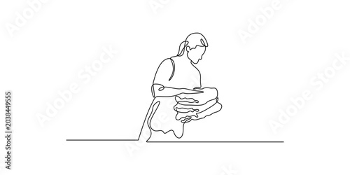 Obraz na płótnie Chambermaid putting stack of fresh towels in bedroom continuous one line drawin