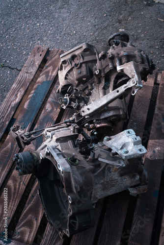 manual transmission from an old front-wheel drive car removed for cleaning and washing, repair and replacement of oil seals
