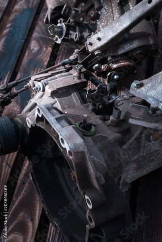 manual transmission from an old front-wheel drive car removed for cleaning and washing, repair and replacement of oil seals
