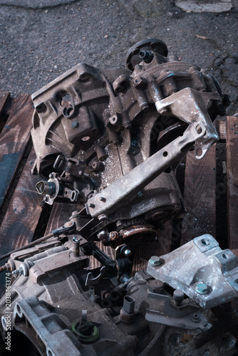 manual transmission from an old front-wheel drive car removed for cleaning and washing, repair and replacement of oil seals