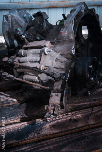 manual transmission from an old front-wheel drive car removed for cleaning and washing, repair and replacement of oil seals