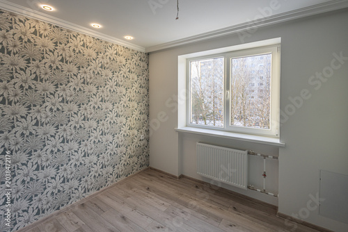Minimalist room interior with botanical wallpaper