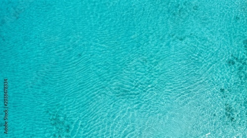Crystal Clear Ocean Water Water Turquoise Clear Aerial Waves Nature Sea. Concept featuring water, turquoise, clear, aerial, waves for professional commercial design.