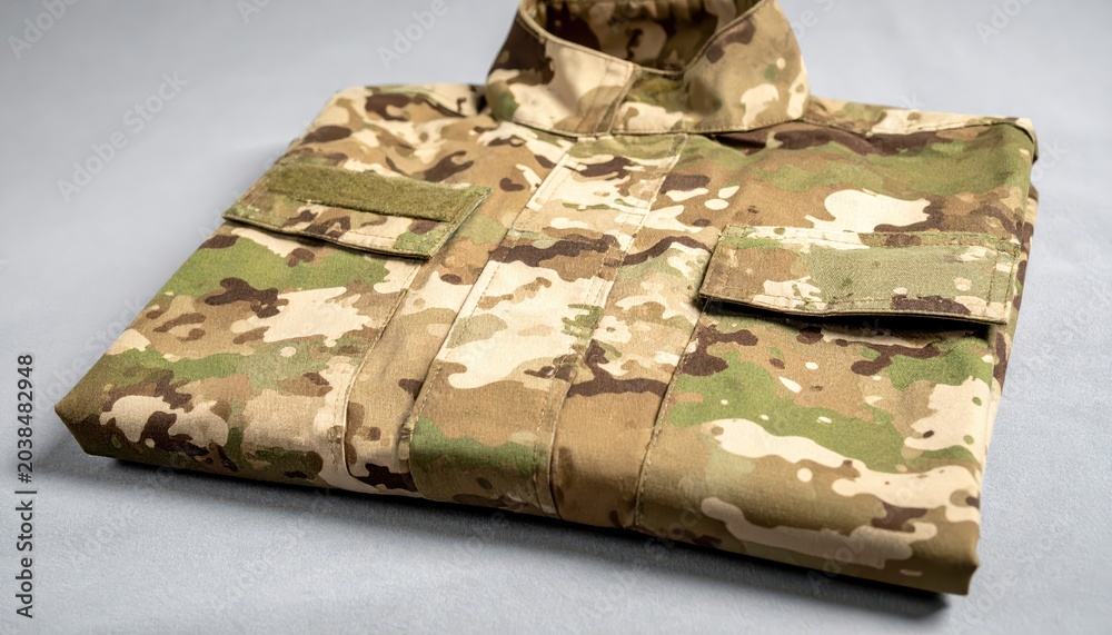 Fototapeta premium Detailed modern camouflage combat uniform fabric pattern