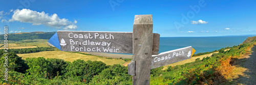 Billede på lærred Signpost for the South West coast path at Porlock weir , Somerset, UK