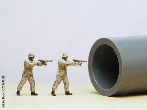 Konstfotografi Mini toy of action figure at table with blurred background