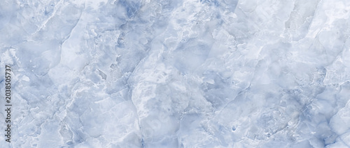 Onyx background displays a stunning blue crystal surface with detailed natural organic mineral details