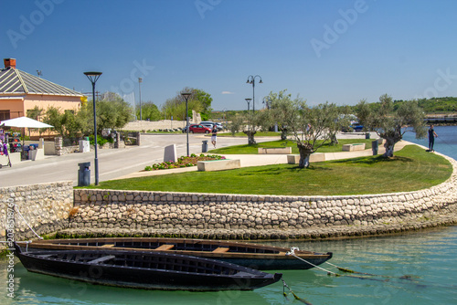 Fotografi Boats at the gate to old part of Nin town in Croatia