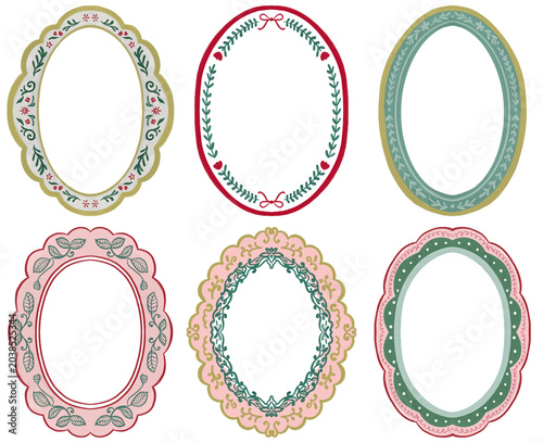 a beautiful collection of oval decorative frames with intricate floral and leaf patterns, rendered as a realistic illustration.