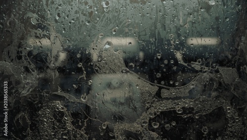 Dust and grime on mirror and glass window creating a textured grunge surface