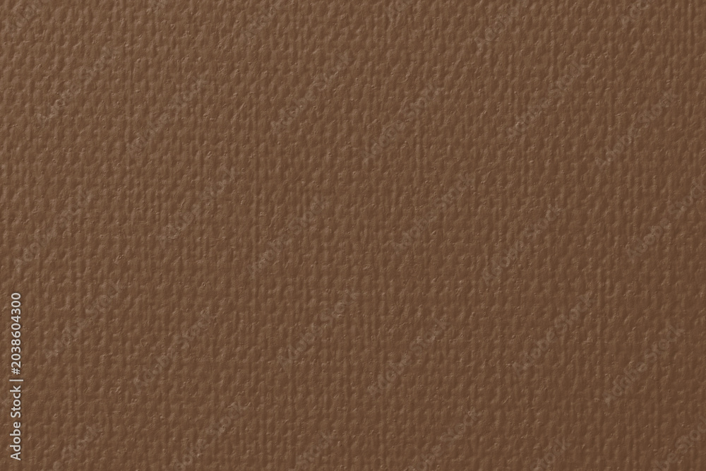 Fototapeta premium Brown textured leather background with a subtle grainy pattern.