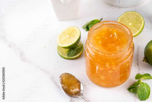 Картината върху платно Homemade Sweet and Sour Lime Jam Marmalade, golden citrus marmalade preserves wi
