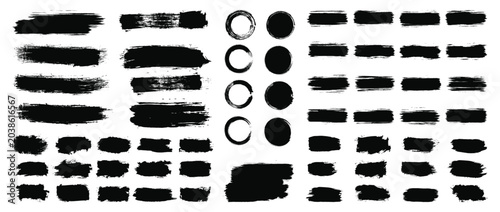 Photos Set of paint brush stroke, ink splash and grungy decoration elements