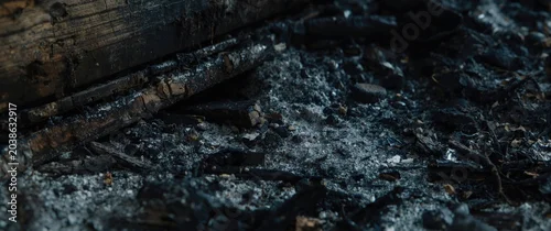 Panel kuchenny z motywem Detailed close up of burnt boards and ashes revealing fire damage in wooden house