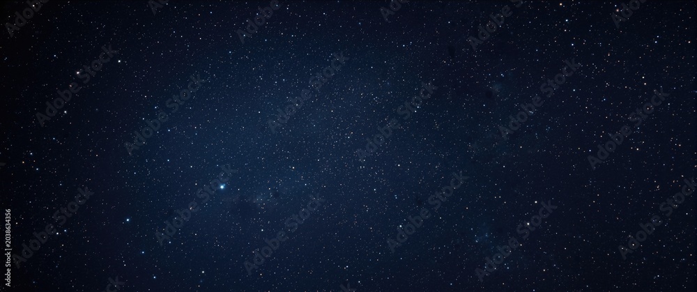 Fototapeta premium Colorful sharp star scattered night sky universe background