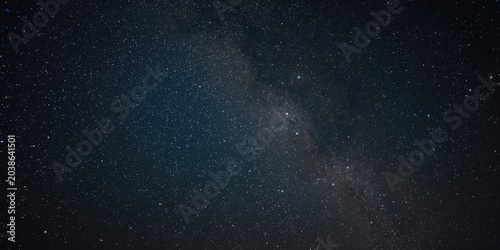 Dark sky illuminated by the...