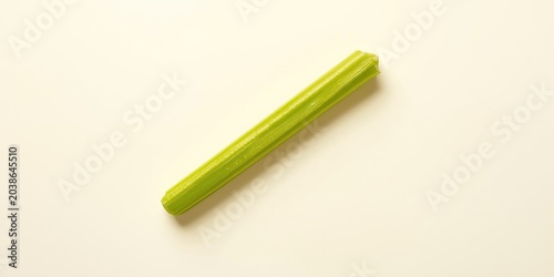 Green celery rib placed on ...