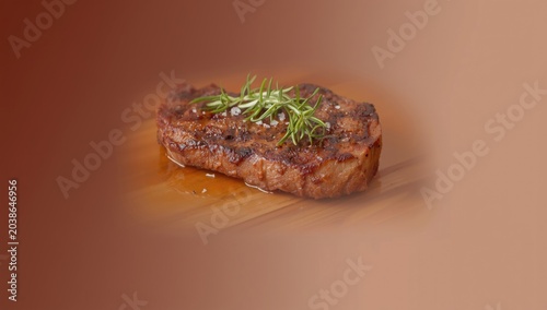 grilled seared steak topped...