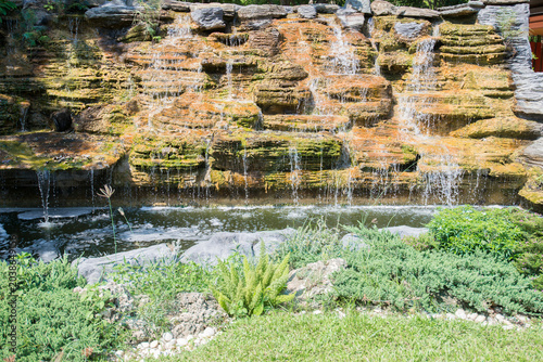 Waterfall in the garden at Chiang Rai province, Thailand.