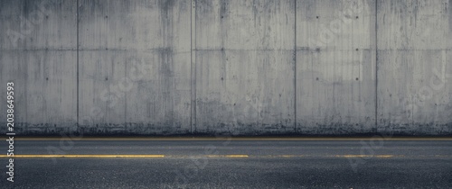Concrete wall and road surf...