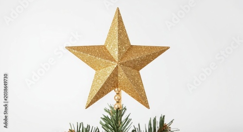 Golden star tree topper wit...