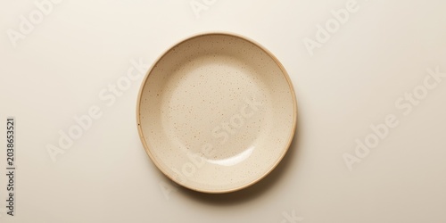 Empty beige dish isolated o...