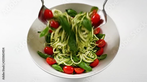 Zucchini Noodles Tossed With Basil And Cherry Tomatoes