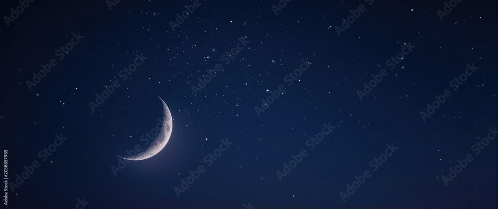 Naklejka premium crescent moon surrounded by radiant stars against deep night sky