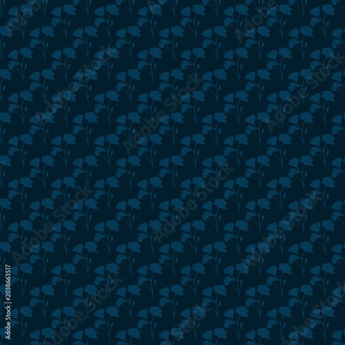 Repeated Pattern of simple shapes in dark colors arranged in a repeated design on a flat surface