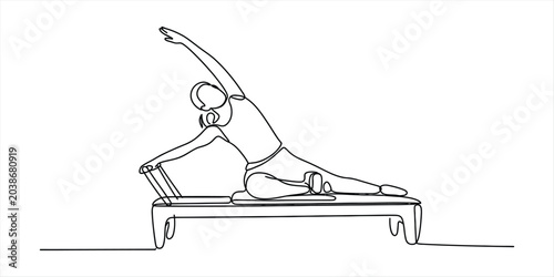 Fotografie Woman doing pilates on a reformer machine, continuous line drawing Vector, illus