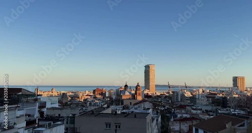 sunset over the city and harbor
