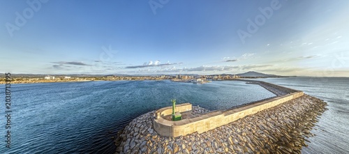 Photos Harbor breakwater of Vinaros at golden hour
