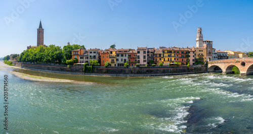 Photos City view of Verona with the Dom Santa Maria Matricolare, Duomo di Verona and Roman bridge Ponte Pietra on the River Adige