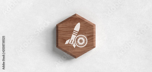 Fotografi Rocket icon with gear symbol on wooden hexagon on white background