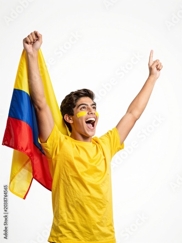 Excited young man holding Colombian flag celebrating victory