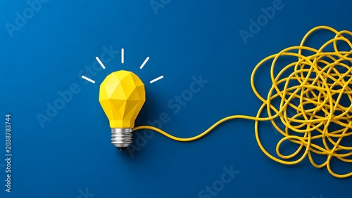 Creative problem solving concept featuring a low poly yellow lightbulb connected to a tangled wire on blue background representing innovation