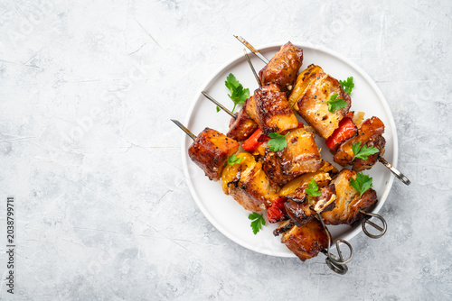 Slika na platnu Grilled shish kebab or meat skewers with vegetables.