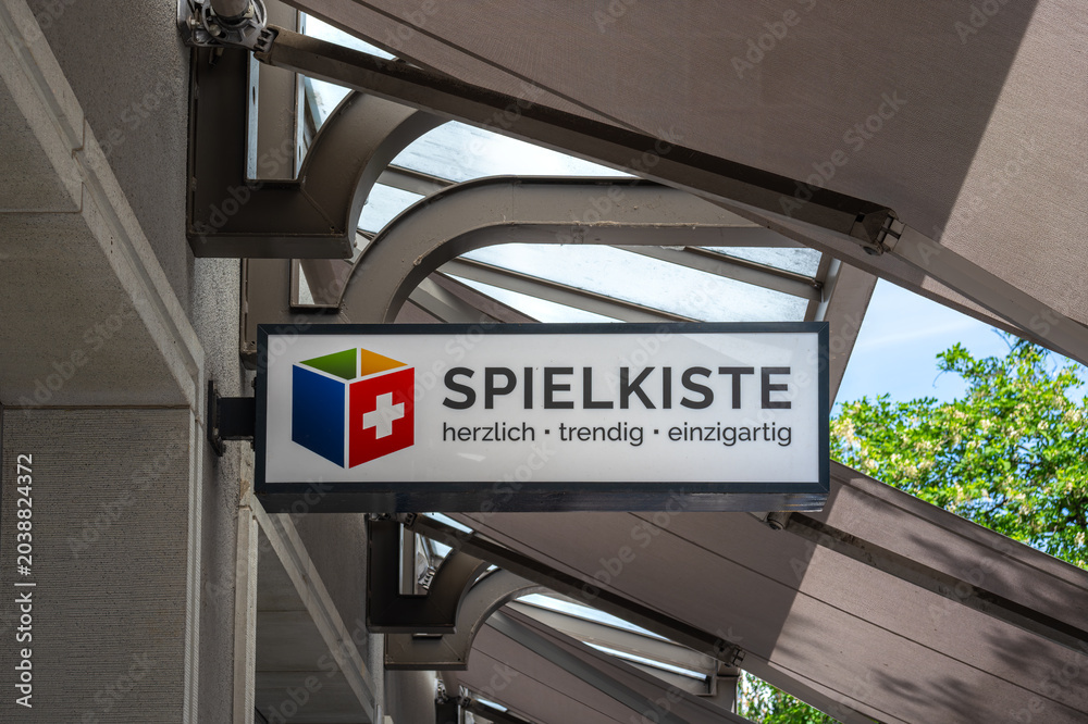 Obraz premium Zurich, Switzerland - May 21, 2026: Spielkiste is a well-known Swiss family-owned retail chain specializing in high-quality toys, board games, and trend items.