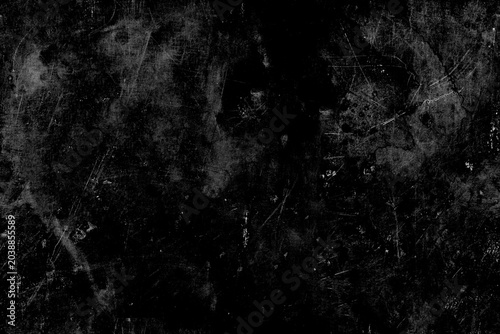 Fotografia Severely scratched black metal surface with heavy scuffs and wear patterns providing realistic grunge texture for industrial designs and vintage photographic manipulation