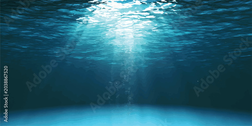Cuadro en lienzo Sunlight rays streaming through deep blue ocean water surface with underwater su