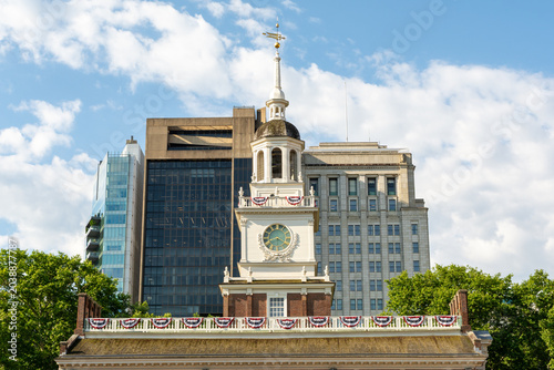 Clock tower and roofline of Independence Hall in Philadelphia, Pennsylvania, a landmark of American independence and democracy.