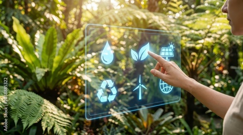 Hand touching environmental icons on virtual screen in nature