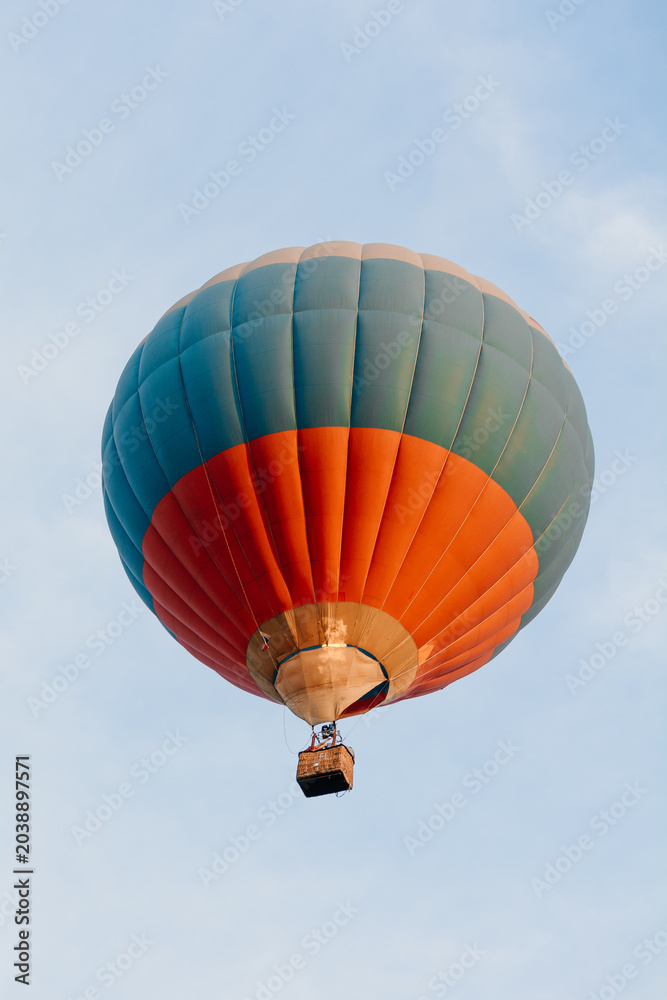 Fototapeta premium tricolor balloon in sky, red blue white, flying in sky