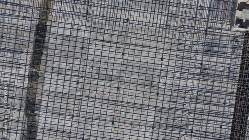 Aerial Video of Reinforced Building Frame Under Tower Crane