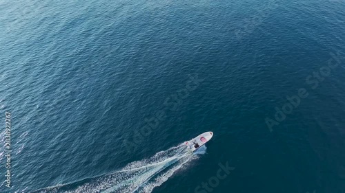 Aerial Video of Small Boat Moving in Direction of Port