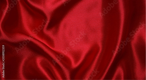 Foto Luxurious red satin fabric with soft folds and shiny texture for backgrounds or