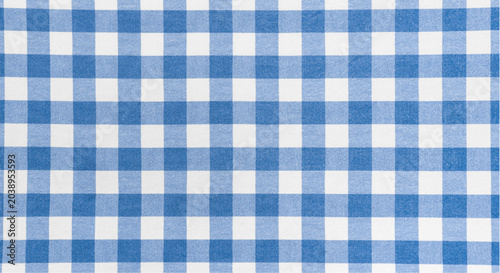 Schilderij op canvas Blue and white checkered fabric texture background with gingham pattern