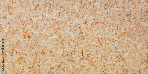 Fotografía Full frame texture of abstract recycled wooden strand board backdrop